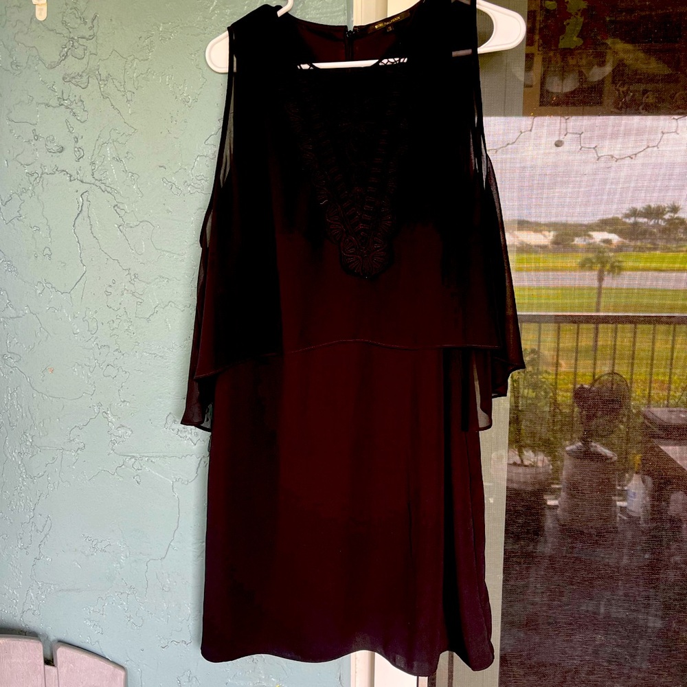 Very pretty black aline dress, has sheer flow top with embroidery v!!